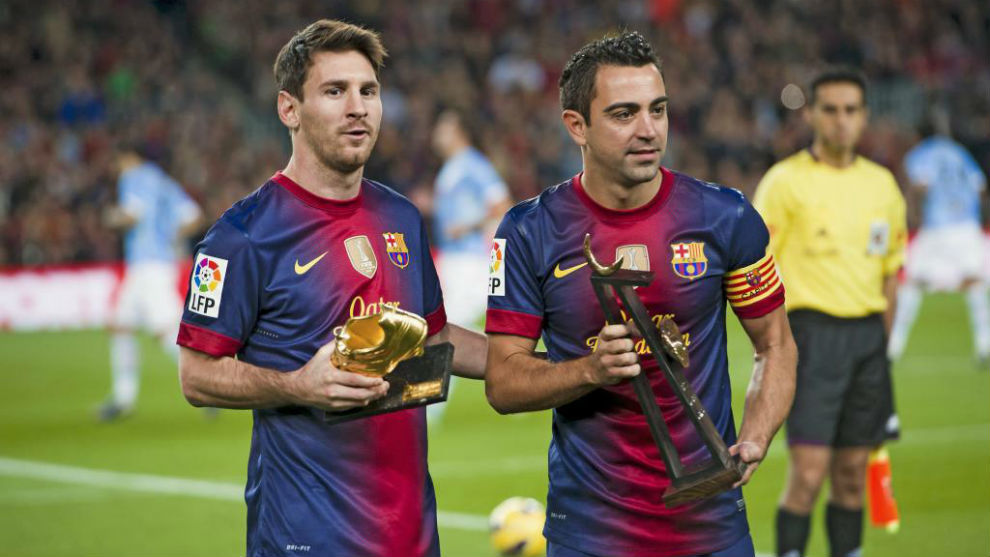 Lionel Messi y Xavi Hernández, compañeros en el Barcelona.